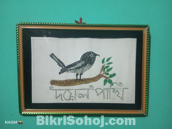 পুতি বসা দোয়েল পাখির ওয়ালমেট